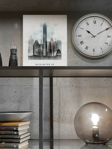 Art print of Washington DC skyline featuring notable buildings and a clock on a shelf.