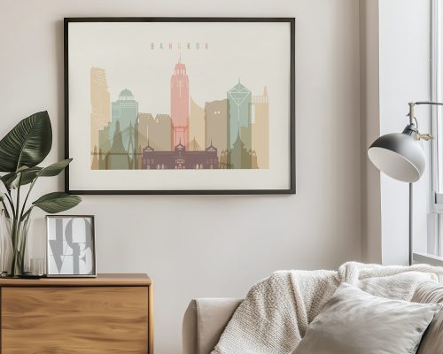 Framed artwork depicting a stylized skyline of Bangkok with various buildings and structures.