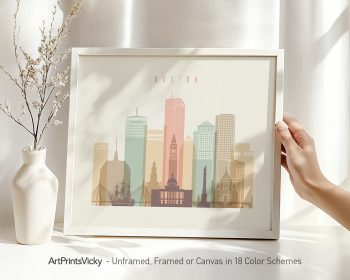 Framed artwork depicting a stylized cityscape of Boston with various buildings and a ship.