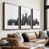 Three black and white cityscape art prints featuring Boston's skyline and landmarks.