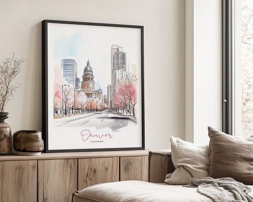 A black framed art print of Denver in watercolor drawing with soft pastel tones.