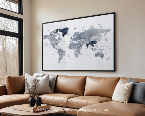 World map artwork featuring grey and blue tones displayed in a modern living room setting.