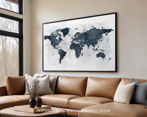 World map artwork in navy tones displayed in a modern living room setting.