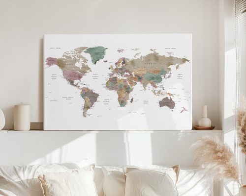 World map illustration with various colors representing different countries and regions displayed on a wall.