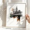 Framed artwork depicting a cityscape of Nashville with a bridge and skyline.