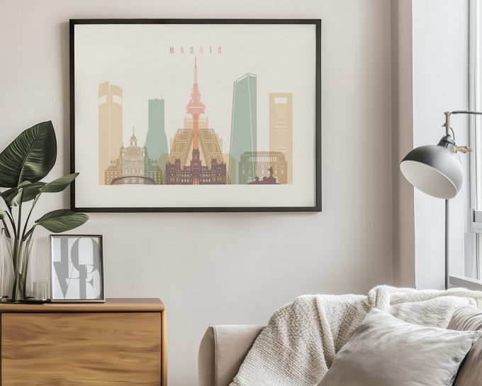 Art print featuring a stylized cityscape of Madrid with notable buildings and landmarks.