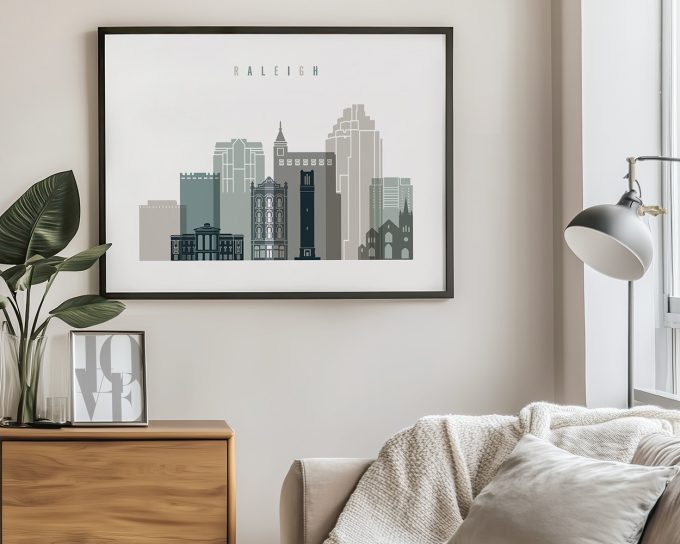 Illustration of Raleigh city skyline featuring various buildings in muted colors.