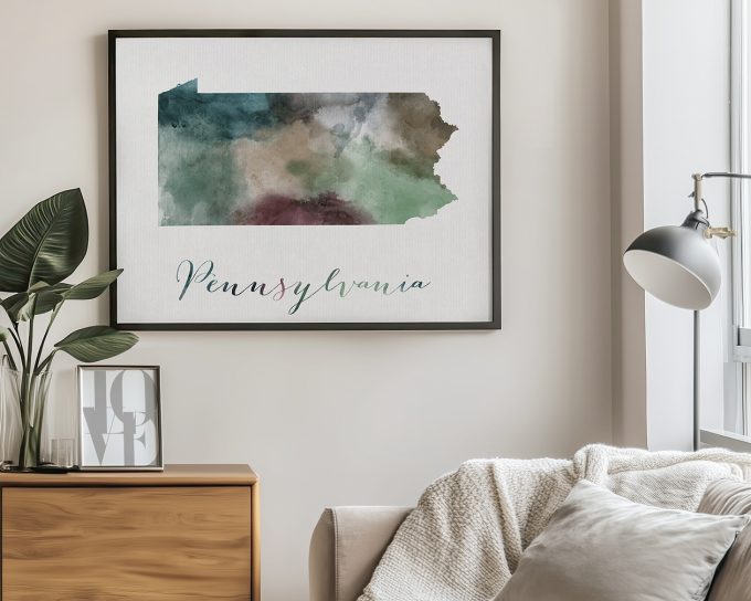 Watercolor map of Pennsylvania with a green and brown color scheme displayed in a framed format.
