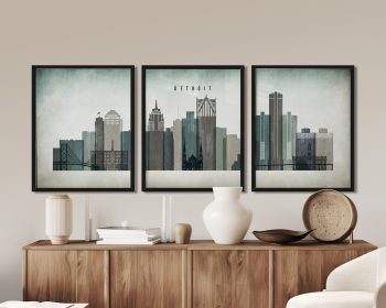 Triptych artwork featuring a stylized cityscape of Detroit with buildings and a bridge.