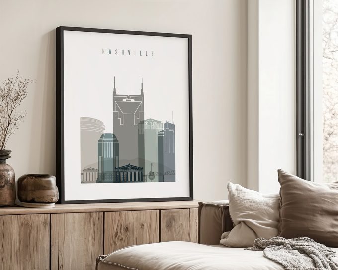 Framed art print of Nashville's skyline featuring various buildings in muted colors.