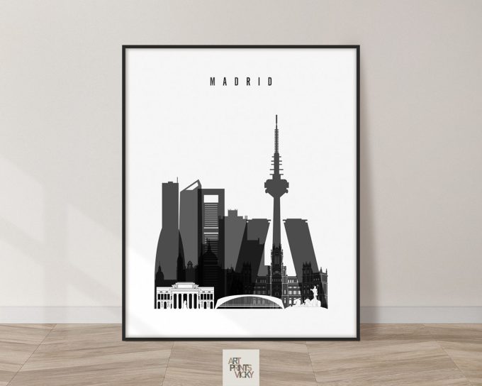 Black and white illustration of Madrid skyline with notable buildings and structures.