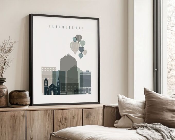 Framed artwork of Albuquerque featuring buildings and hot air balloons in a minimalist style.