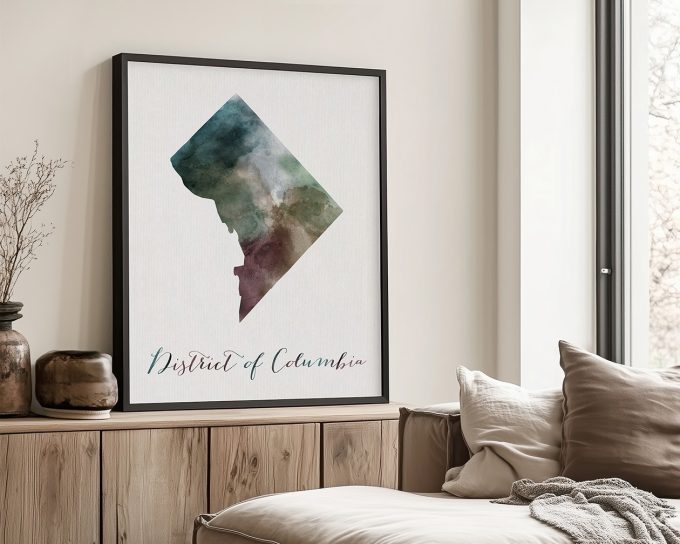 Watercolor art print of the District of Columbia in a framed display on a wall.