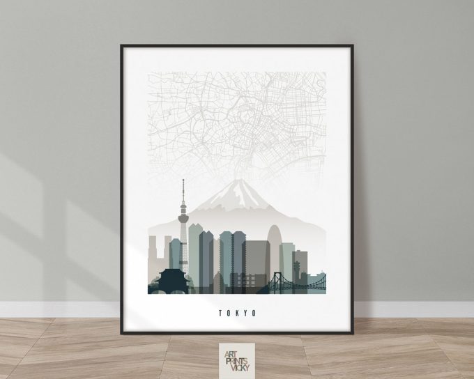 Framed artwork depicting a cityscape of Tokyo with Mount Fuji in the background.