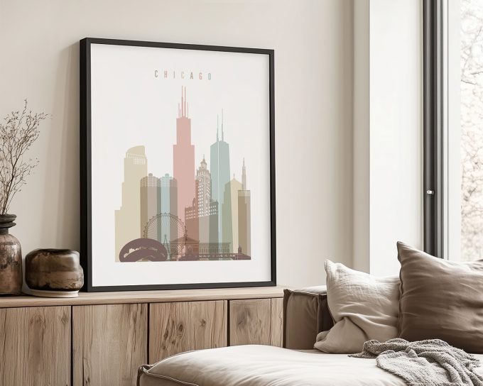 Framed artwork of the Chicago skyline featuring various buildings in pastel colors.