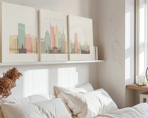 Three canvas art prints depicting a stylized cityscape of Philadelphia with notable buildings.