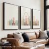Three framed art prints depicting a stylized cityscape of Saint Louis with notable landmarks.
