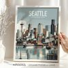 Framed artwork depicting a cityscape of Seattle with the Space Needle and waterfront.