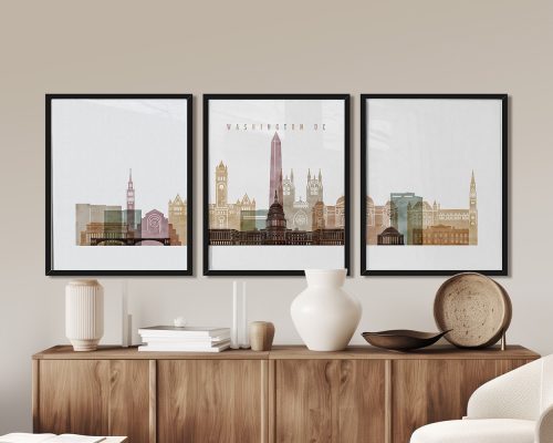 Three framed art prints depicting a stylized cityscape of Washington DC with notable buildings.