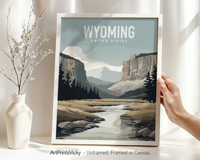 Art print featuring a stylized landscape of Wyoming with mountains and a river.
