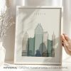 Art print of the Austin city skyline featuring various buildings in muted colors.