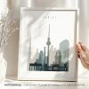 Framed print of Berlin cityscape featuring notable landmarks in a minimalist design.