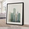 Framed cityscape print of Boston featuring prominent buildings and skyline in muted colors.