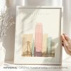 Art print featuring a stylized cityscape of Bratislava with various buildings in pastel colors.