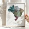 Watercolor map of Brazil displayed in a frame with a neutral background.