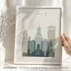 Art print of the Buffalo city skyline featuring various building silhouettes in muted colors.