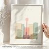 Art print featuring a stylized cityscape of Calgary with notable buildings and the Calgary Tower.
