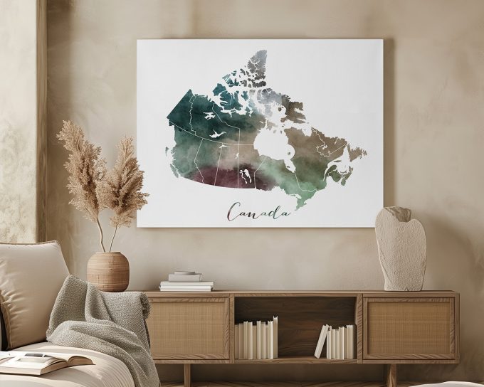 Watercolor map of Canada featuring various shades and outlines of provinces and territories.