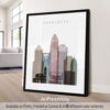 Framed art print of the Charlotte city skyline with various building designs and the word 'Charlotte'.
