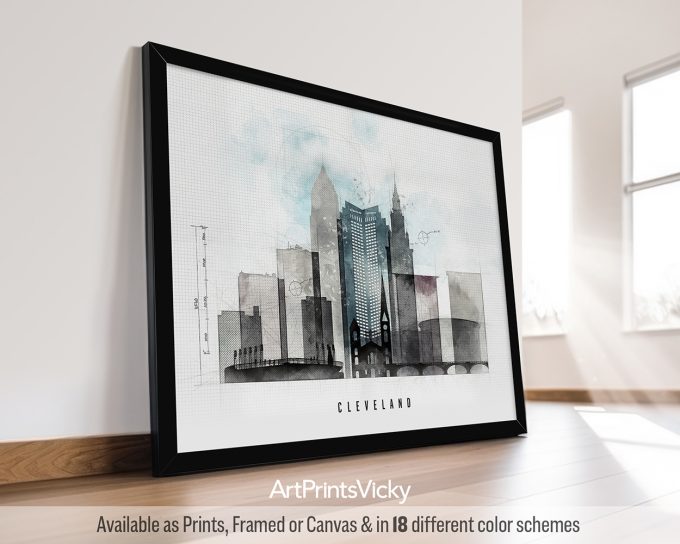 Framed artwork depicting a watercolor cityscape of Cleveland with a bridge and skyline.