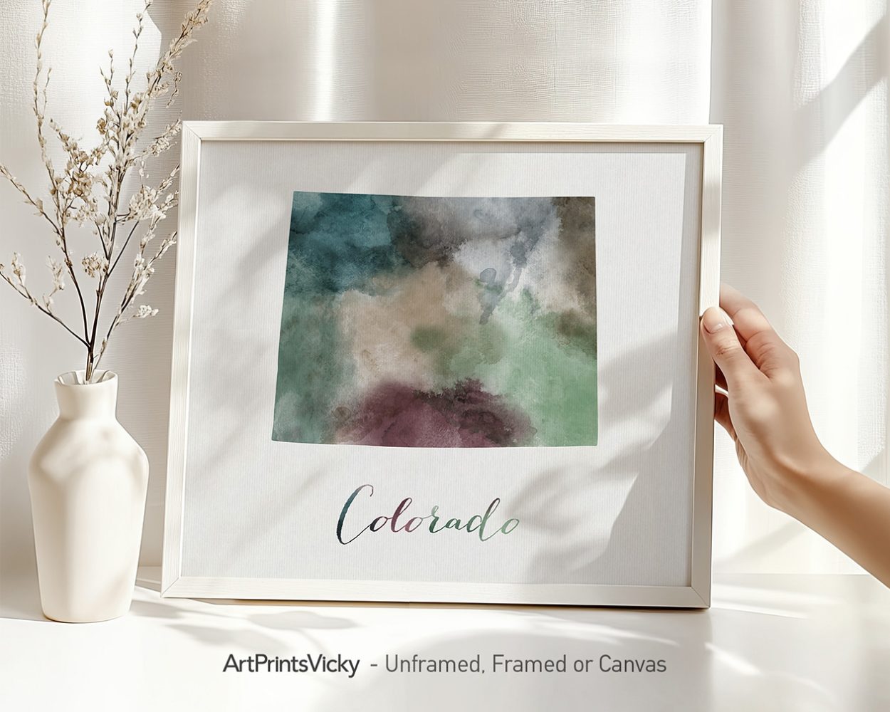 Framed watercolor art print featuring abstract colors and the word 'Colorado'.