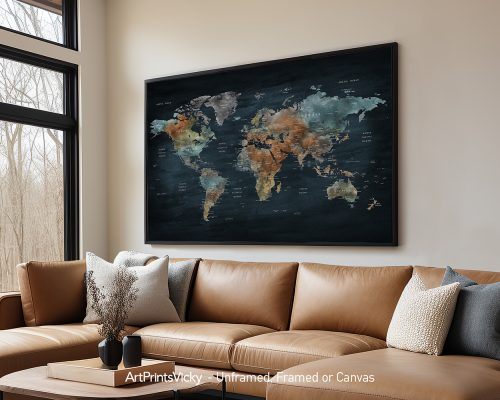 World map artwork featuring various colors displayed on a wall above a brown leather sofa.