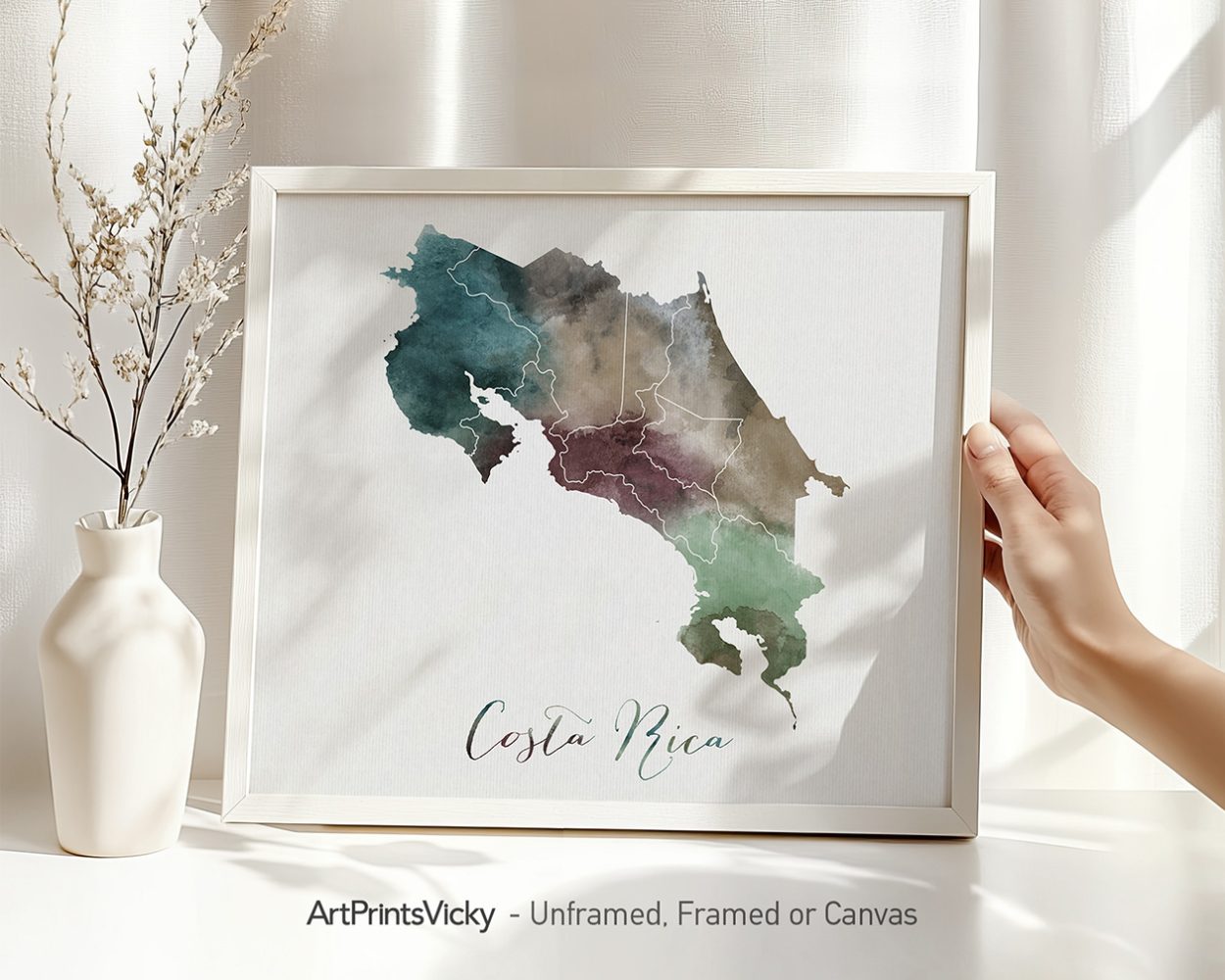Artistic representation of a map of Costa Rica with watercolor effects in various colors.