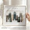 Art print of Denver cityscape featuring buildings and mountains in a minimalist style.