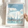 Framed artwork depicting a cityscape of Dubai with the Burj Khalifa and clouds.