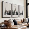 Three framed art prints depicting a cityscape of Edinburgh in a neutral color palette.