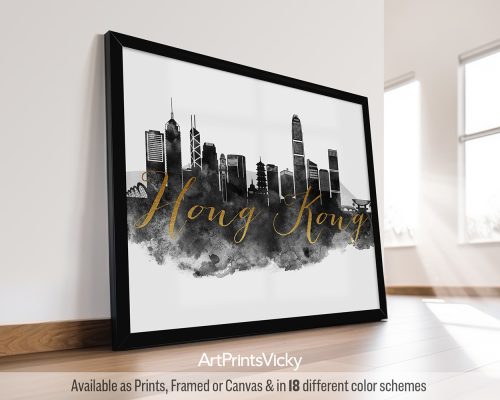 Black and white poster of the Hong Kong skyline featuring Victoria Harbour, towering skyscrapers. The print is in contrasting tones with a decorative faux gold title by ArtPrintsVicky.