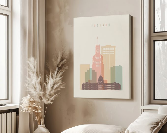 Art print of a cityscape featuring buildings and a clock tower with the name 'JACKSON' at the top.