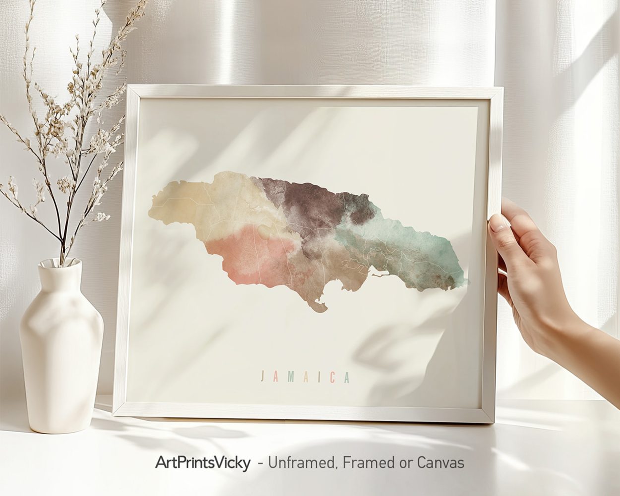 Artistic representation of a map of Jamaica with watercolor textures in various colors.