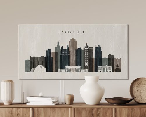 Art print featuring a stylized skyline of Kansas City with various building silhouettes.
