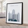 Framed cityscape print of Kansas City featuring its skyline and notable buildings.