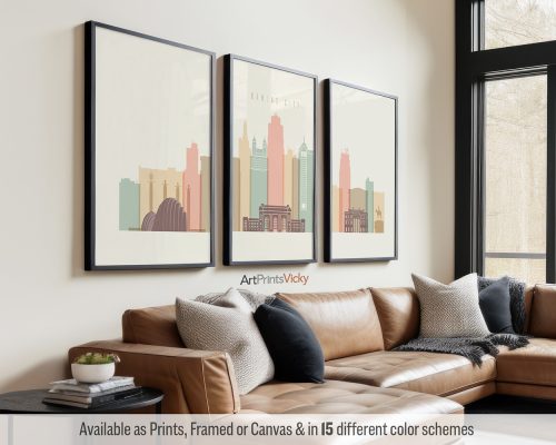 Kansas City skyline triptych featuring the Kauffman Center, iconic landmarks, and vibrant cityscape in a warm Pastel Cream palette, divided into three modern prints. by ArtPrintsVicky.