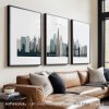 Three framed prints depicting a stylized cityscape of London with notable landmarks.