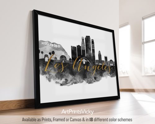 Black and white poster featuring the Los Angeles cityscape with iconic landmarks in a bold style. The title is written in faux gold in the middle of cityscape. by ArtPrintsVicky.