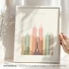 Art print featuring a stylized skyline of Manila with various building shapes and colors.