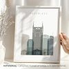 Art print featuring the Nashville city skyline in a minimalist design with various buildings.